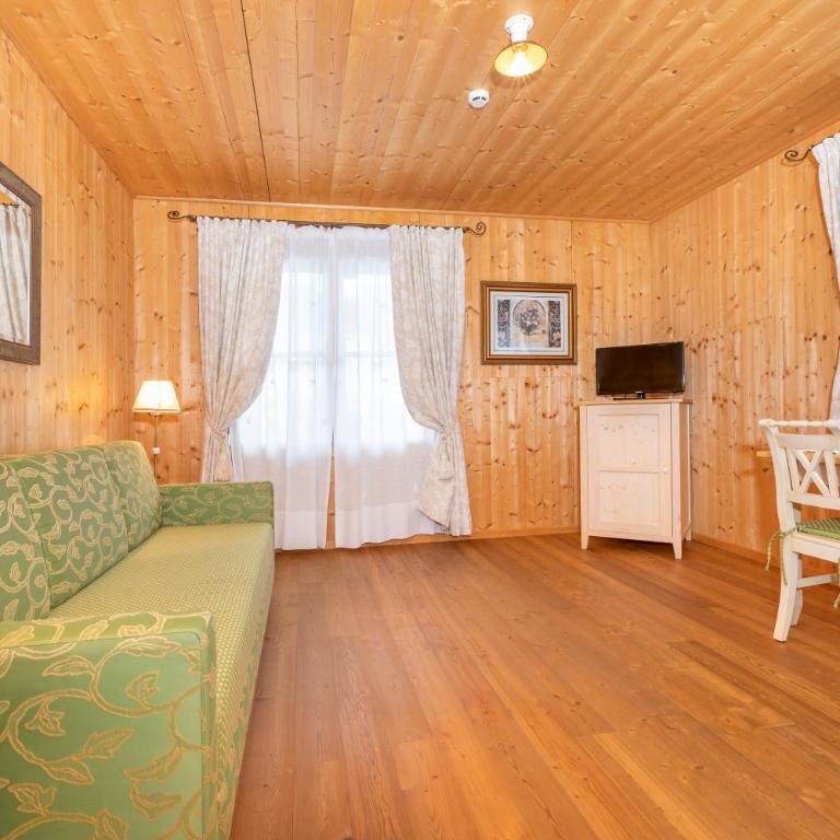 Hotel Garni Sonnhof - Familiensuite mit Balkon und Bergblick - 1