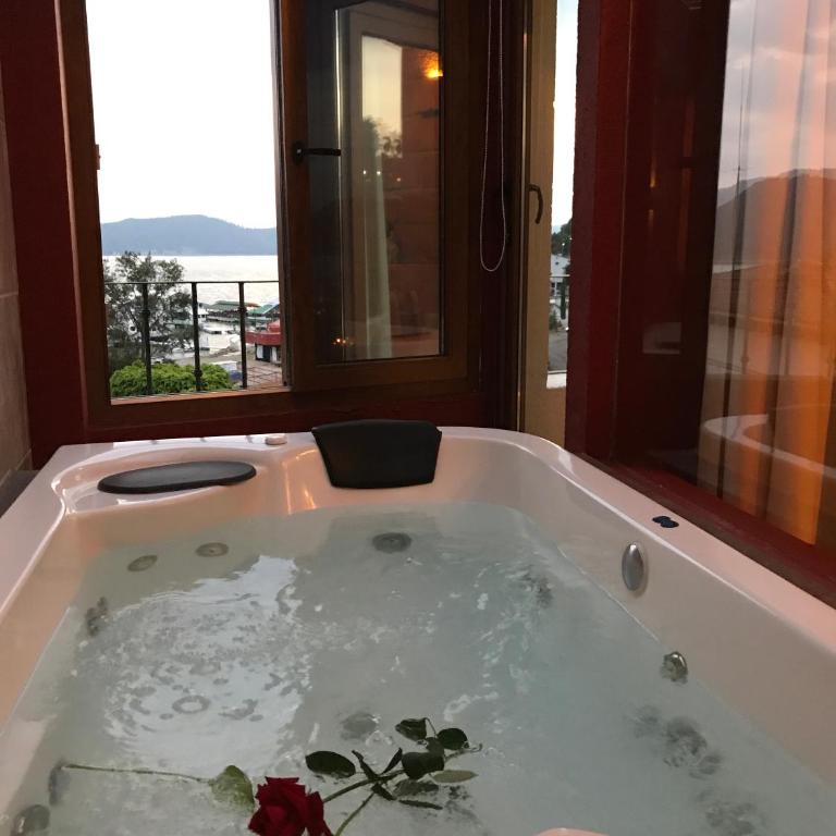 Hotel puesta del sol - Suite con bañera de hidromasaje y cama grande - 7