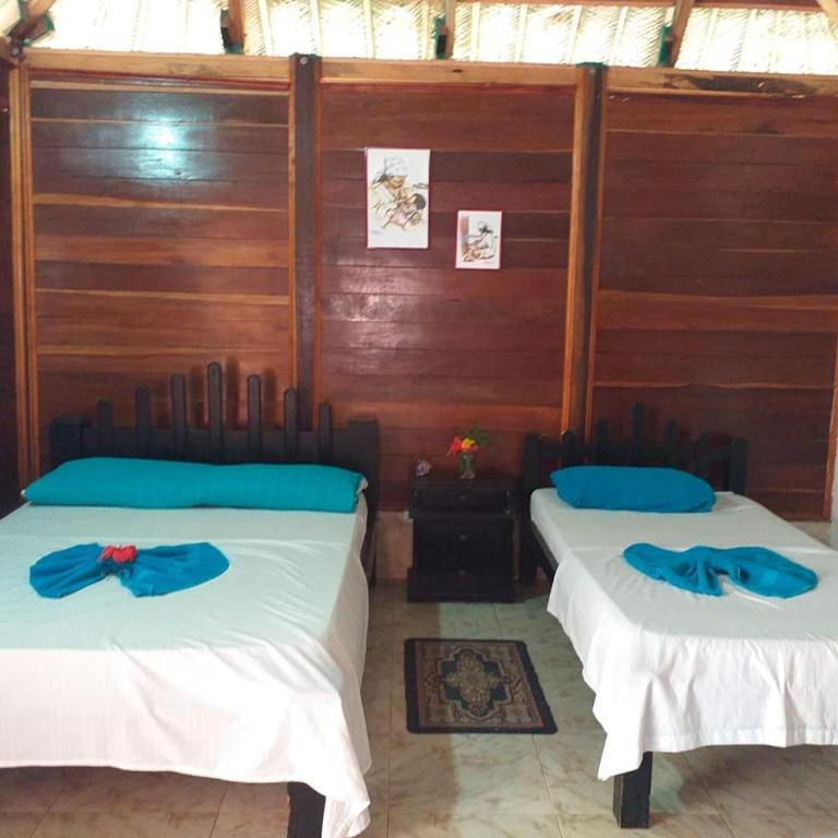 Hostal Recuerdos del Tayrona - Habitación Cuádruple con baño privado - 1