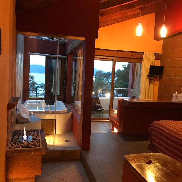 Hotel puesta del sol - Suite con bañera de hidromasaje y cama grande - 1