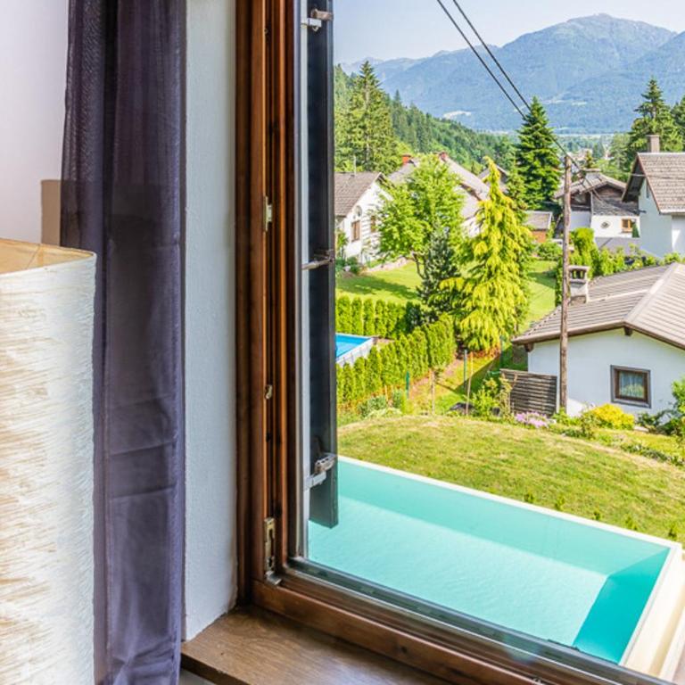 Haus Sieben - Singer Lydia - Apartment mit Poolblick - 1