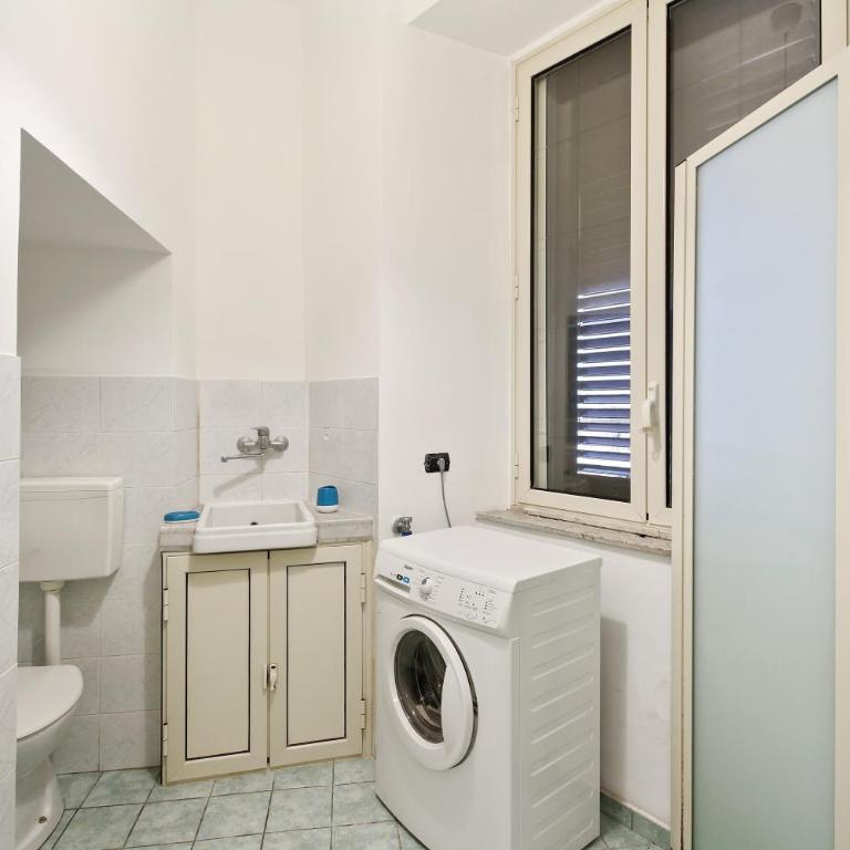 GuestHost - Central Flat with Balconies and Bicycle! - Two-Bedroom Apartment - 24