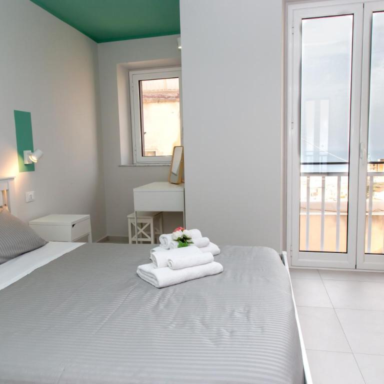 Guest House Nonnolorè - Camera Matrimoniale con Letto Supplementare - 12