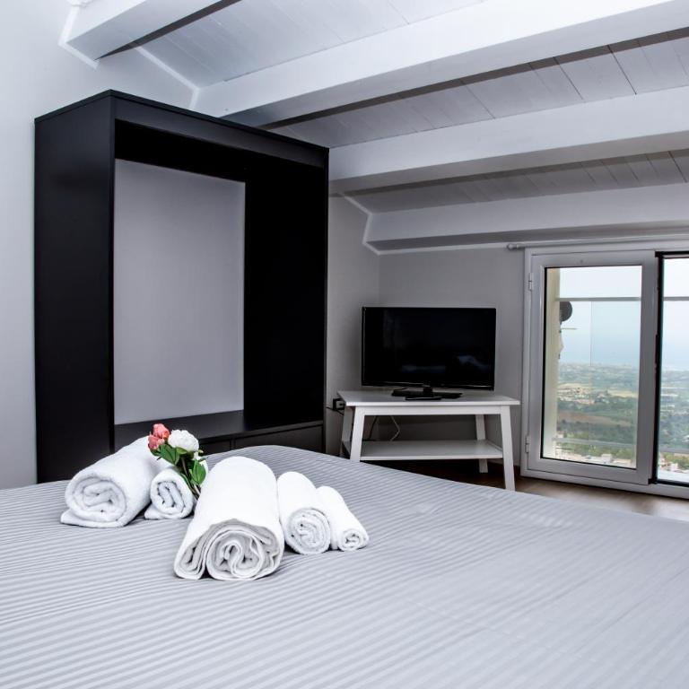 Guest House Nonnolorè - Camera Matrimoniale Deluxe con 1 Letto Supplementare - 4