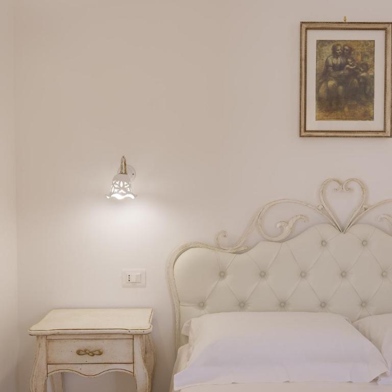 Dimora San Quirico - b&b Cisternino Valle D'Itria - Camera Quadrupla Superior - 1
