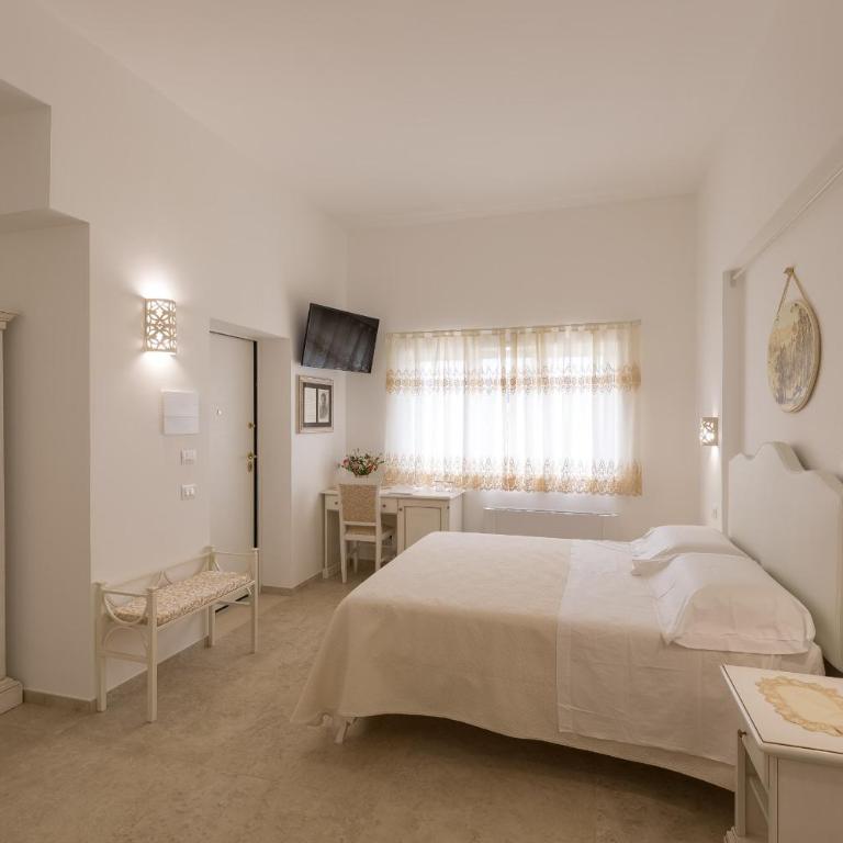 Dimora San Quirico - b&b Cisternino Valle D'Itria - Camera Quadrupla con Terrazza - 1