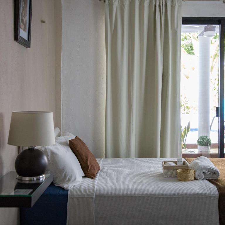 Margarett Hotel - Habitación Cuádruple - vistas al jardín - 4