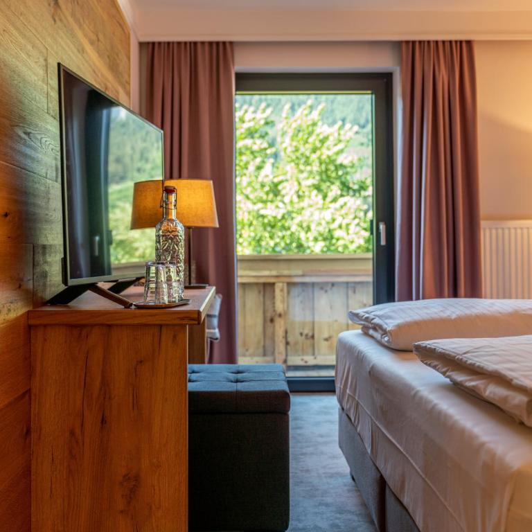 Stadtvilla Schladming Boutiquehotel - Doppelzimmer Cozy mit Gartenblick - 4