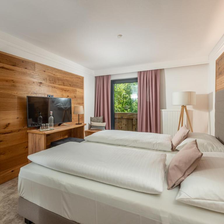 Stadtvilla Schladming Boutiquehotel - Comfort Doppelzimmer mit Balkon und Gartenblick - 2