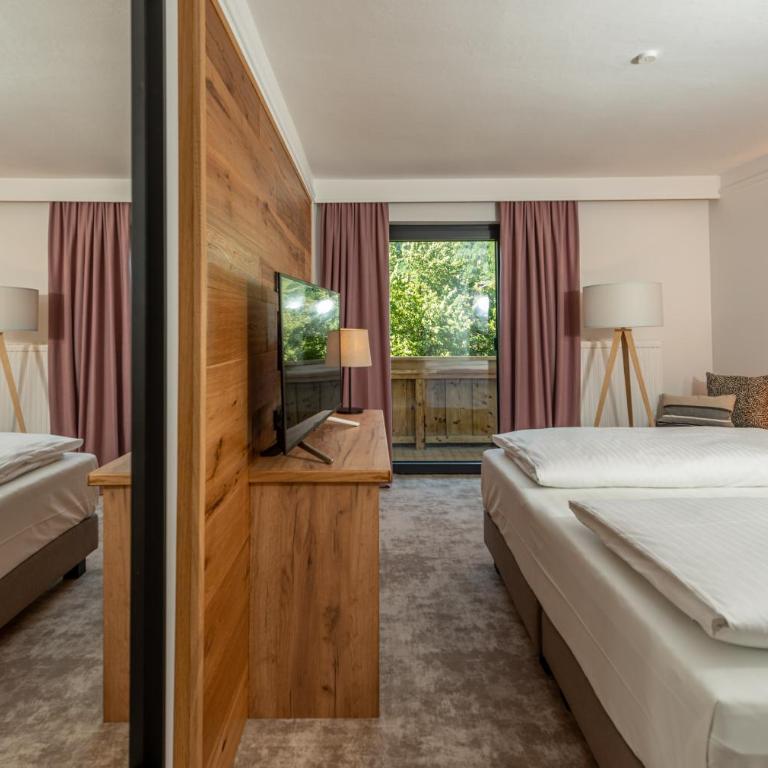 Stadtvilla Schladming Boutiquehotel - Comfort Doppelzimmer mit Balkon und Gartenblick - 3