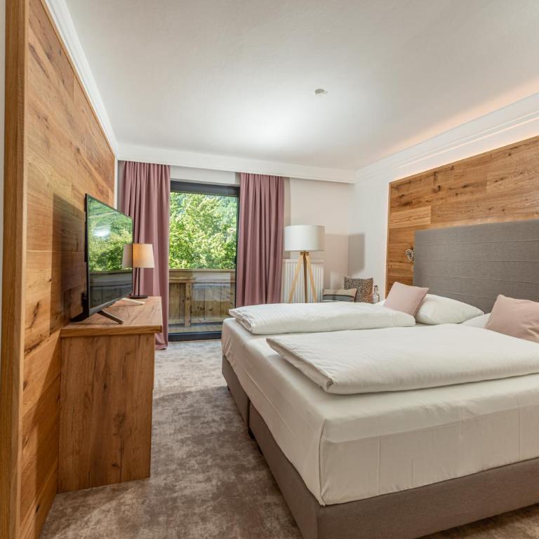 Stadtvilla Schladming Boutiquehotel - Comfort Doppelzimmer mit Balkon und Gartenblick - 4