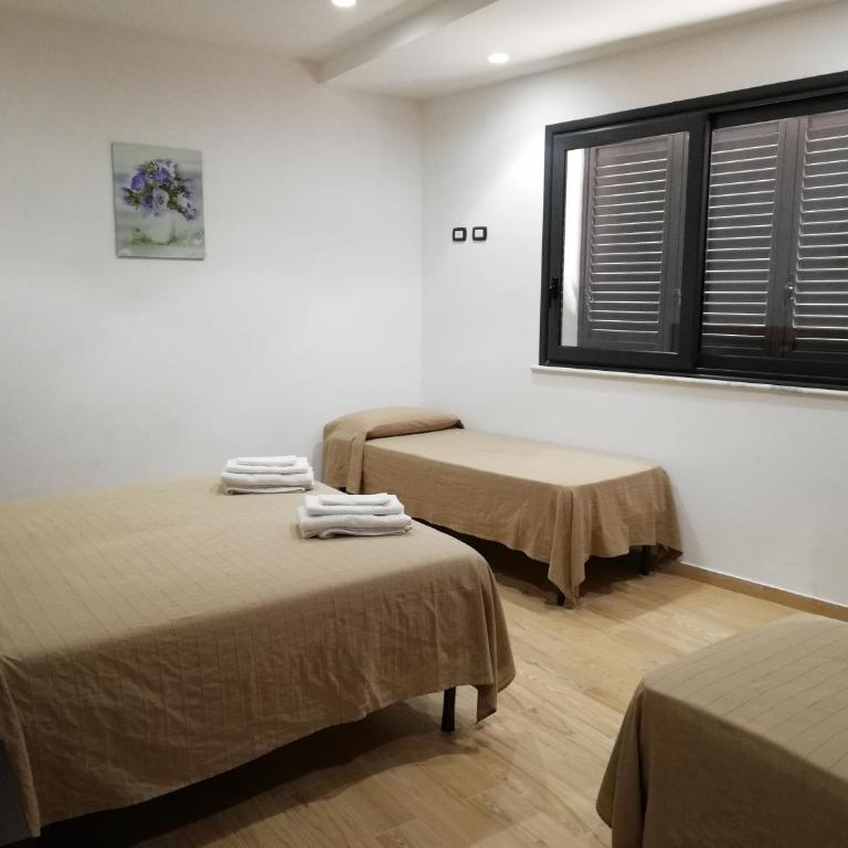 B&B Controtempo - Camera Quadrupla Comfort - 5