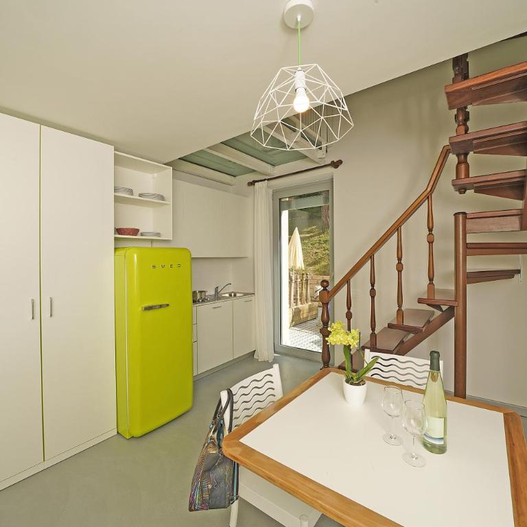 Residence Arca - Appartamento Monolocale Plus con Terrazza e Vista Giardino - 12