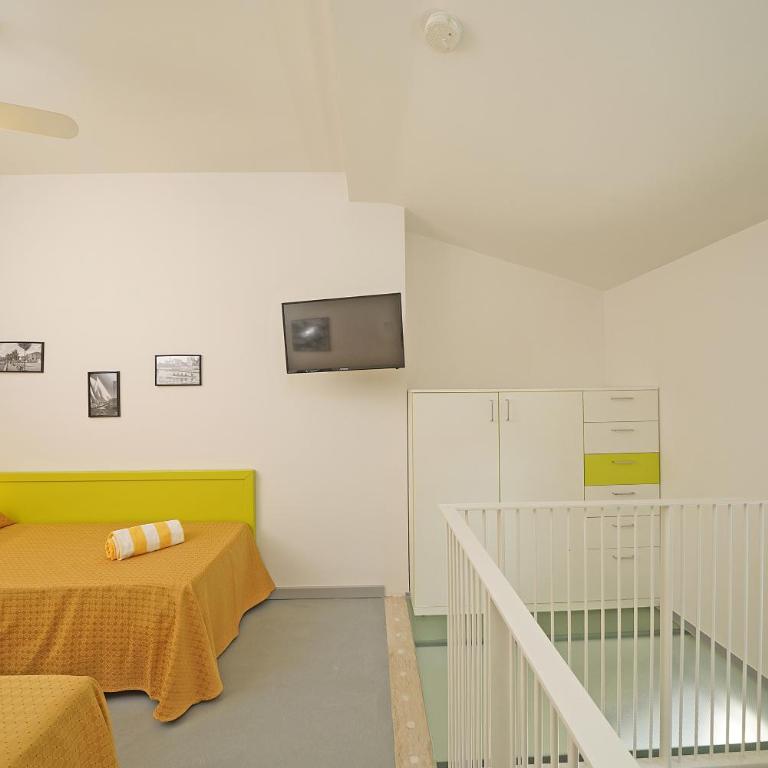 Residence Arca - Appartamento Monolocale Plus con Terrazza e Vista Giardino - 6