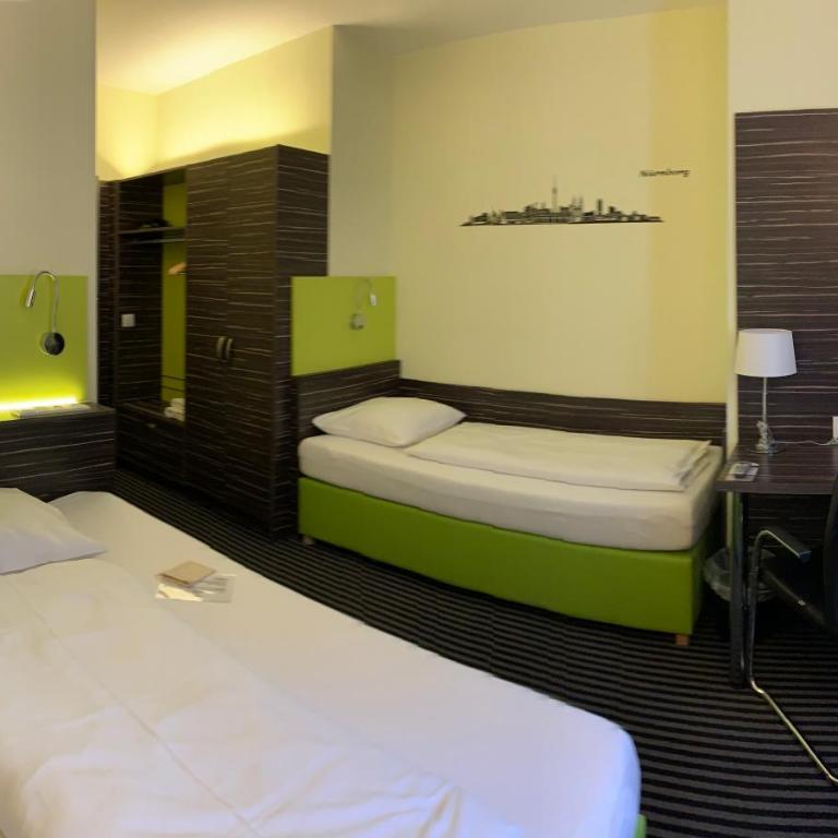 Behringers City Hotel Nürnberg - Standard Dreibettzimmer mit französischem Bett - 8