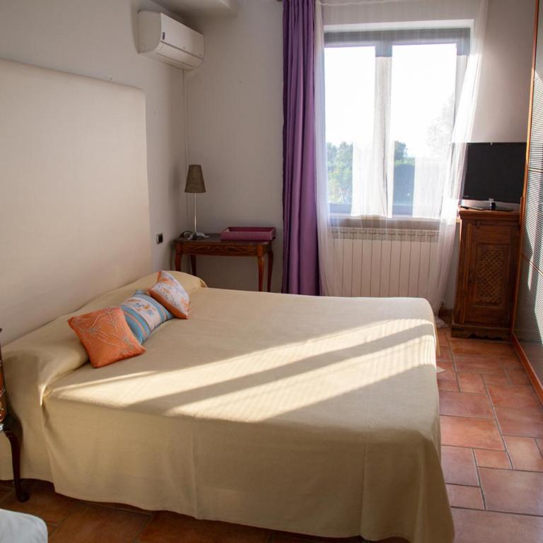 Bed and breakfast Ellera Viterbo - Camera Matrimoniale/Doppia con Letti Singoli con Vista Giardino - 1