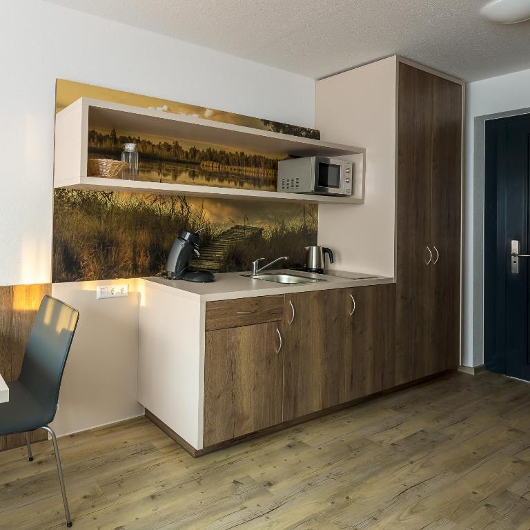 Boarding & HOUSE T24 - Apartment mit Balkon - 2