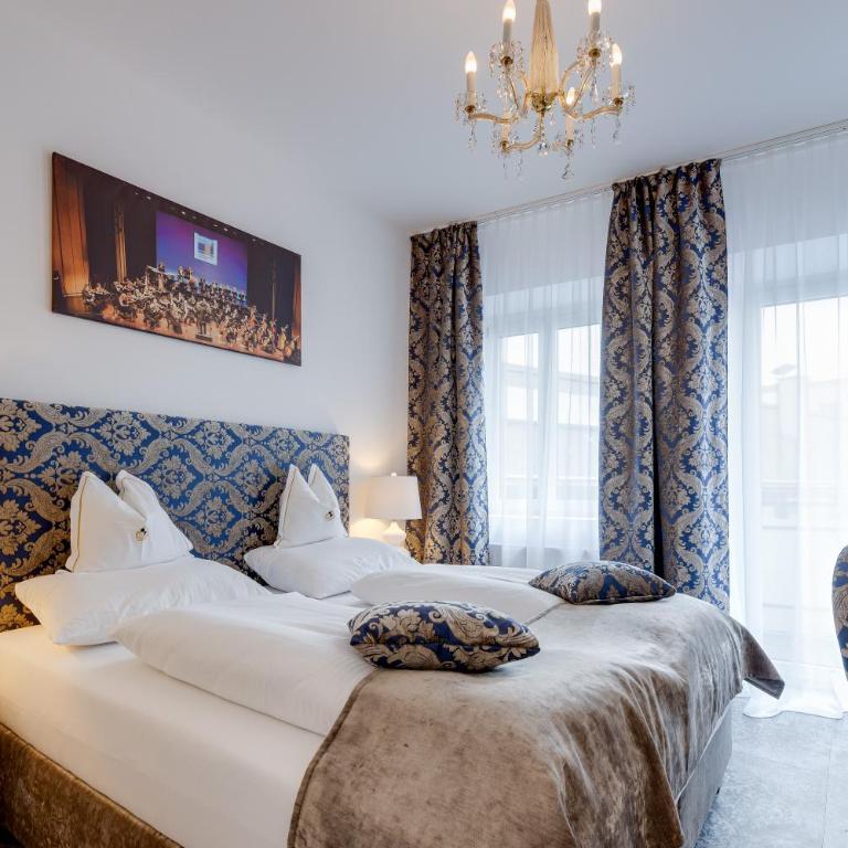 Boutique Hotel Goldenes Lamm Villach - Deluxe Doppelzimmer mit Balkon - 5
