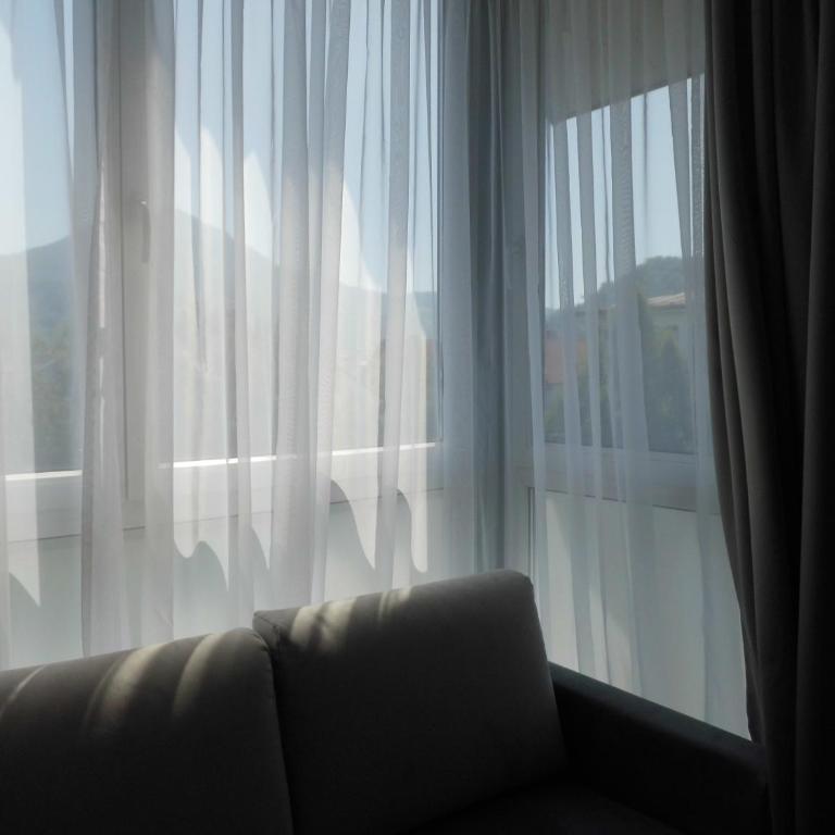 Pension Elisabeth - Rooms & Apartments - Superior Zimmer mit Gartenblick - 9