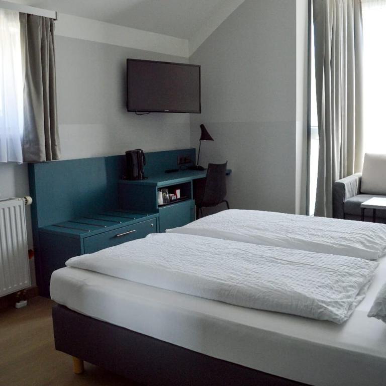 Pension Elisabeth - Rooms & Apartments - Superior Zimmer mit Gartenblick - 13