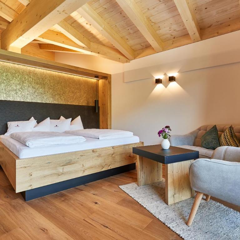Hotel Jörglerhof - Suite mit Kingsize-Bett und Balkon - 1