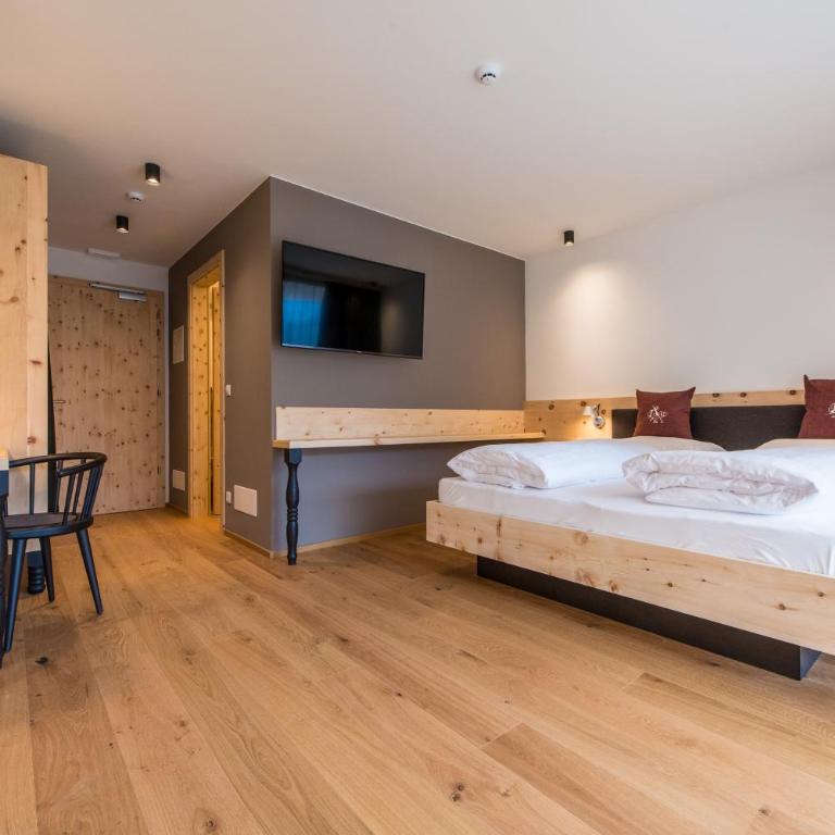 Hotel Alpenrast - Deluxe Doppelzimmer mit Balkon - 7