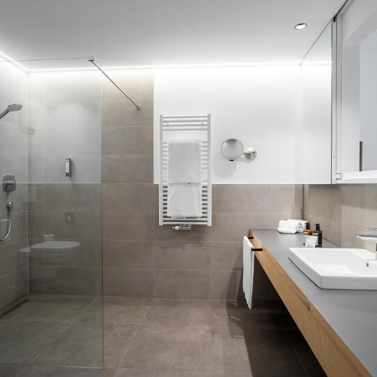 byHaller Suites & AO Restaurant - Suite con Balcone - 1