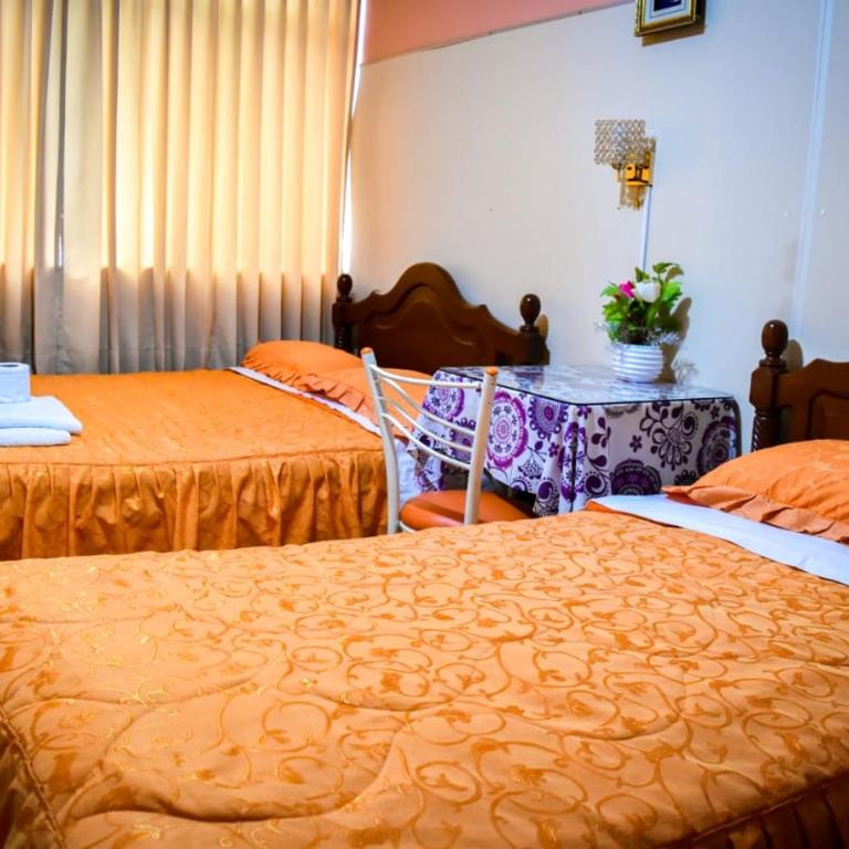 Hospedaje San Pedro Tacna - Habitación Deluxe con 2 camas grandes - 1