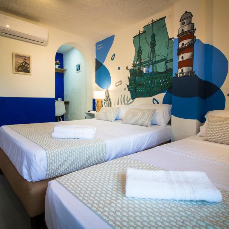 Casa del Puerto Hostel & Suites - Habitación Triple con vistas a la piscina - 5