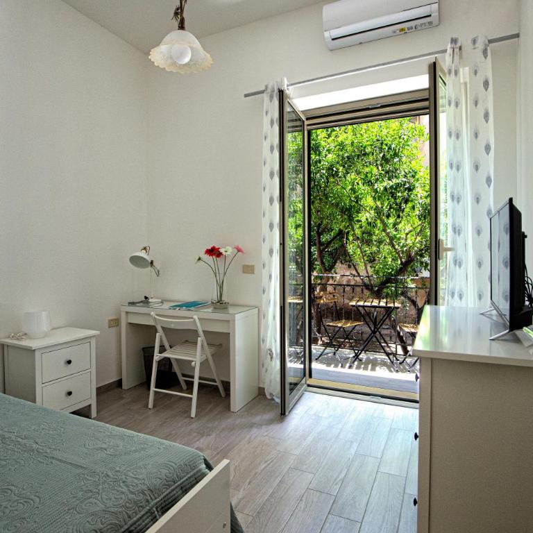 GARDEN HOUSE: APARTMENTS AND ROOMS FOR HOLIDAYS - Apartamento con vistas al jardín - 15