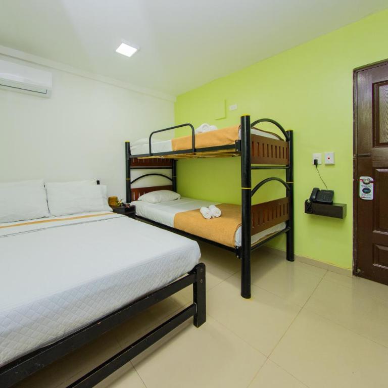 Hotel Marina Suites By GEH Suites - Quadruple Room - 11