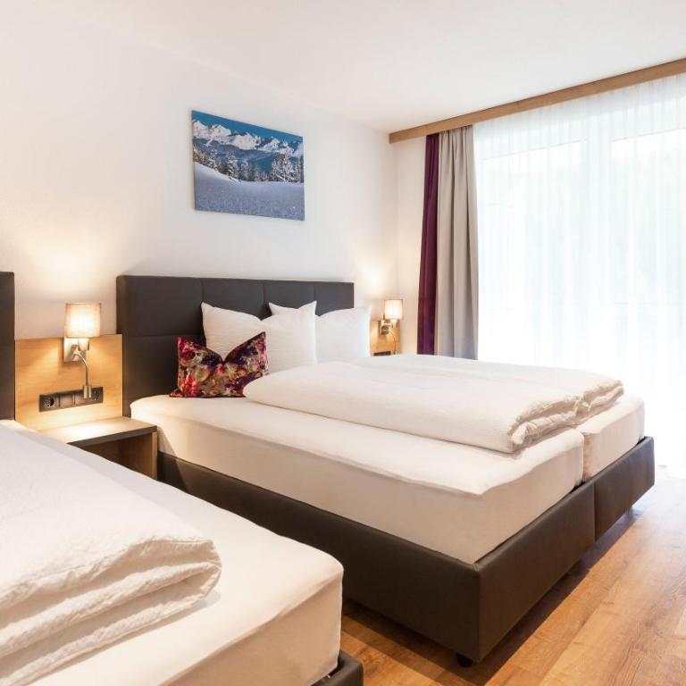 Lerch Suites - Deluxe Apartment mit Balkon - 10