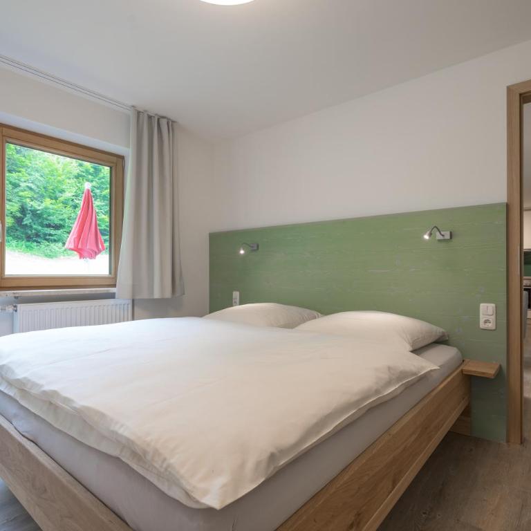 Ferienwohnungen Alpentraum - Landhaus Gutermann - Apartment mit Gartenblick - 1