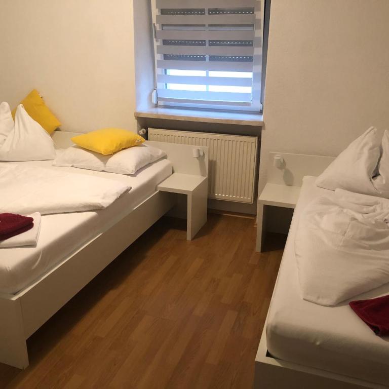 Center Rooms Villach - Habitación Triple - 1