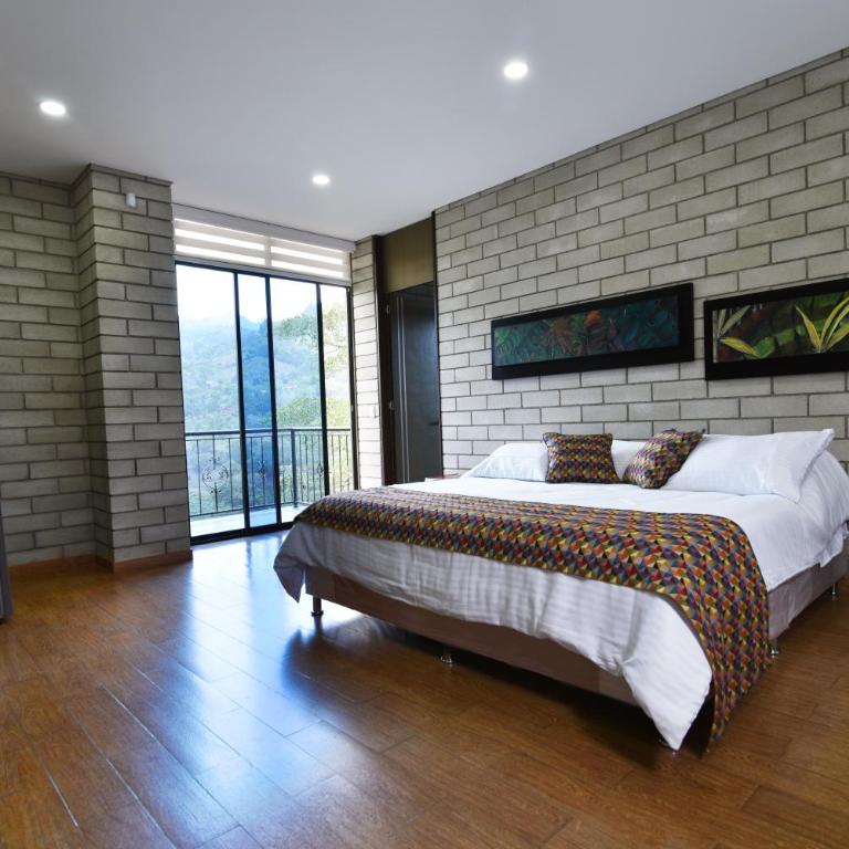 Home Boutique Natural Paradise - Habitación con cama grande y balcón - 1