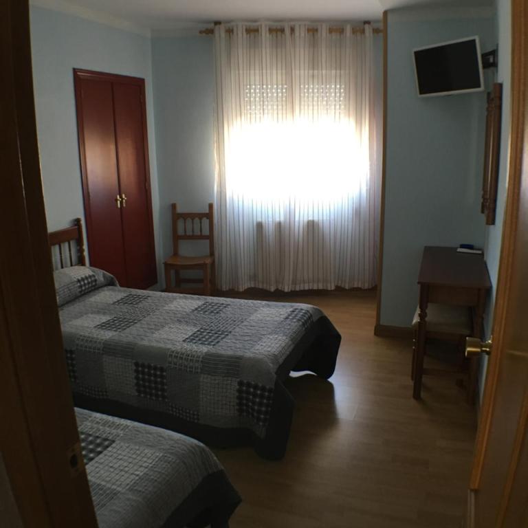 Hostal ** EC León - Habitación Doble - 2 camas - 13