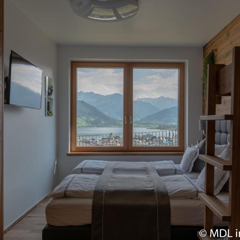 Apartments Adlerhorst Top 1 Zell am See with private sauna and Zell am See Kaprun summercard in summer - Apartment with Terrace - 20