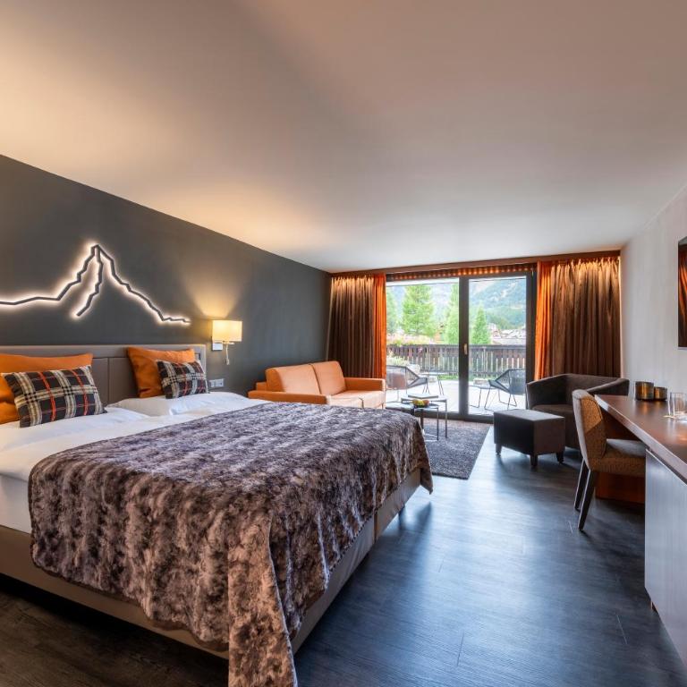 The Christiania Mountain & Spa Resort - Superior Doppelzimmer mit Balkon und Panoramablick auf das Matterhorn - 5