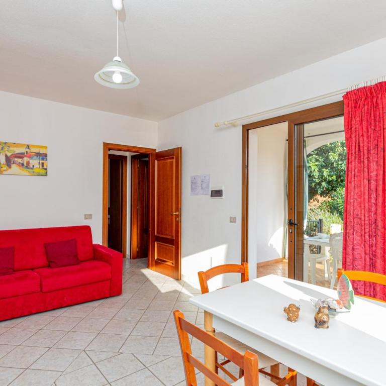 Appartamento Residenziale Trilocale 4 posti letto via Sardegna San Teodoro - Appartamento con 2 Camere da Letto e Vista Giardino - 13