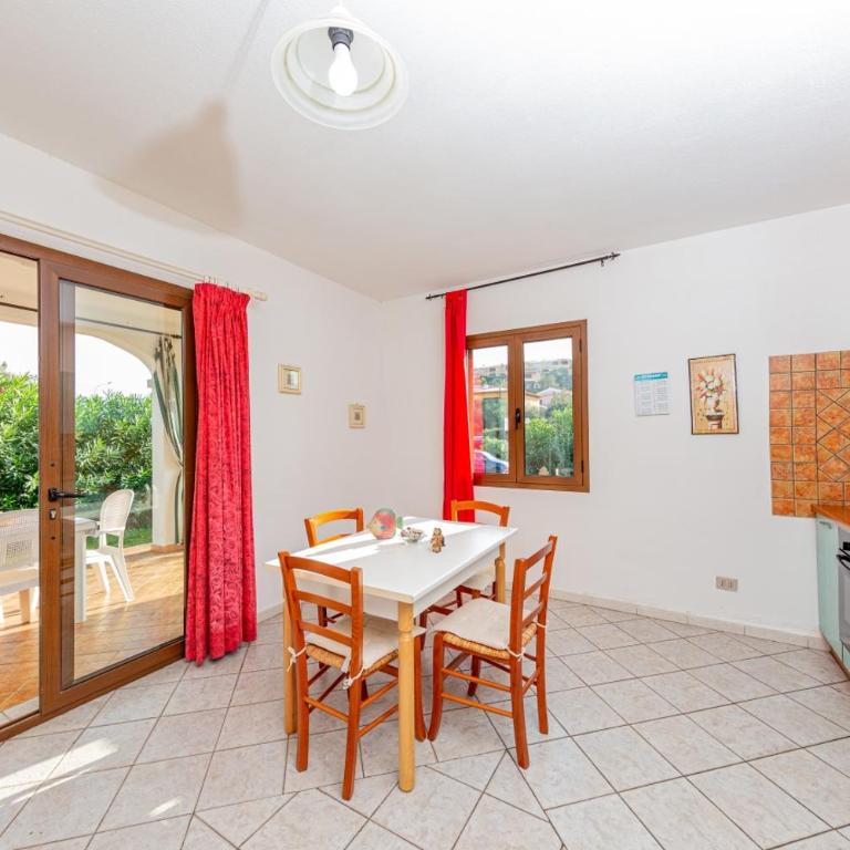 Appartamento Residenziale Trilocale 4 posti letto via Sardegna San Teodoro - Appartamento con 2 Camere da Letto e Vista Giardino - 11
