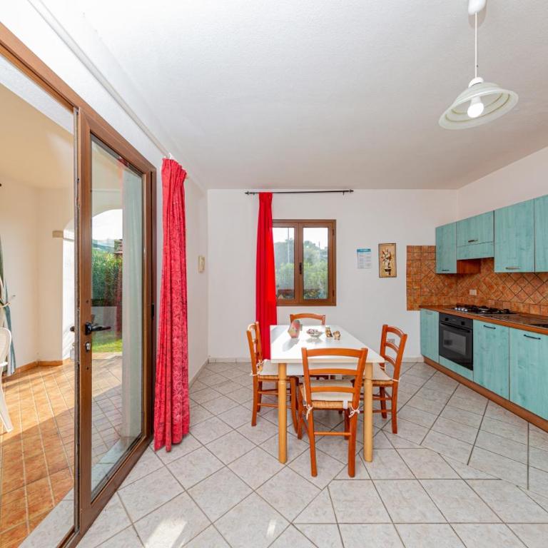 Appartamento Residenziale Trilocale 4 posti letto via Sardegna San Teodoro - Appartamento con 2 Camere da Letto e Vista Giardino - 14
