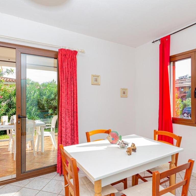 Appartamento Residenziale Trilocale 4 posti letto via Sardegna San Teodoro - Appartamento con 2 Camere da Letto e Vista Giardino - 12