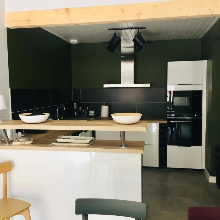 Superbe maison de ville rénovée en plein cœur du quartier Arago - Appartement 2 Chambres - 24