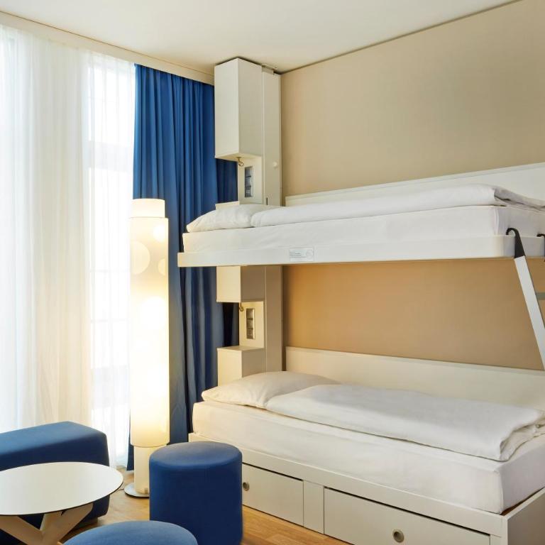 H2 Hotel München Messe - Comfort Vierbettzimmer - 8
