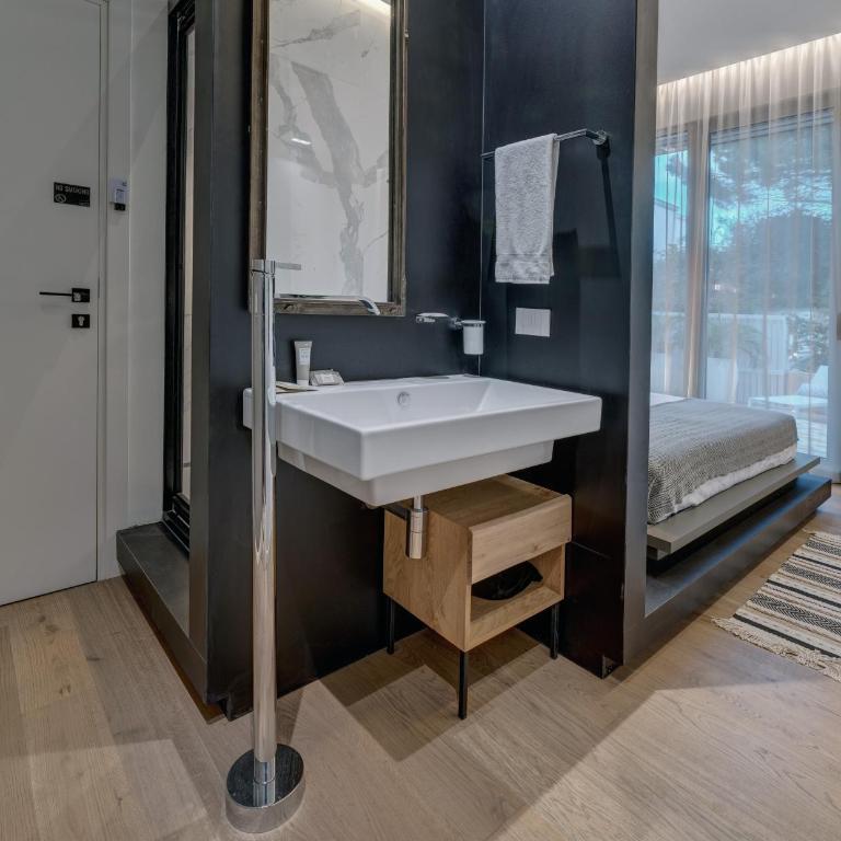 Le Palmette Suites - Camera Matrimoniale con Patio - 11