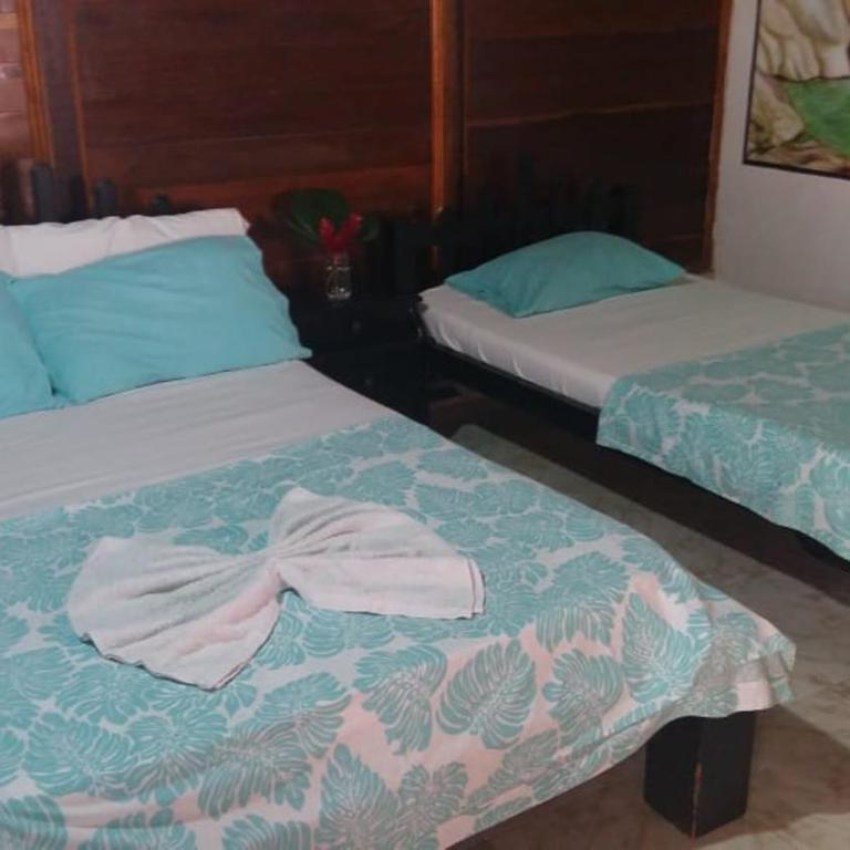 Hostal Recuerdos del Tayrona - Habitación Cuádruple con baño privado - 1