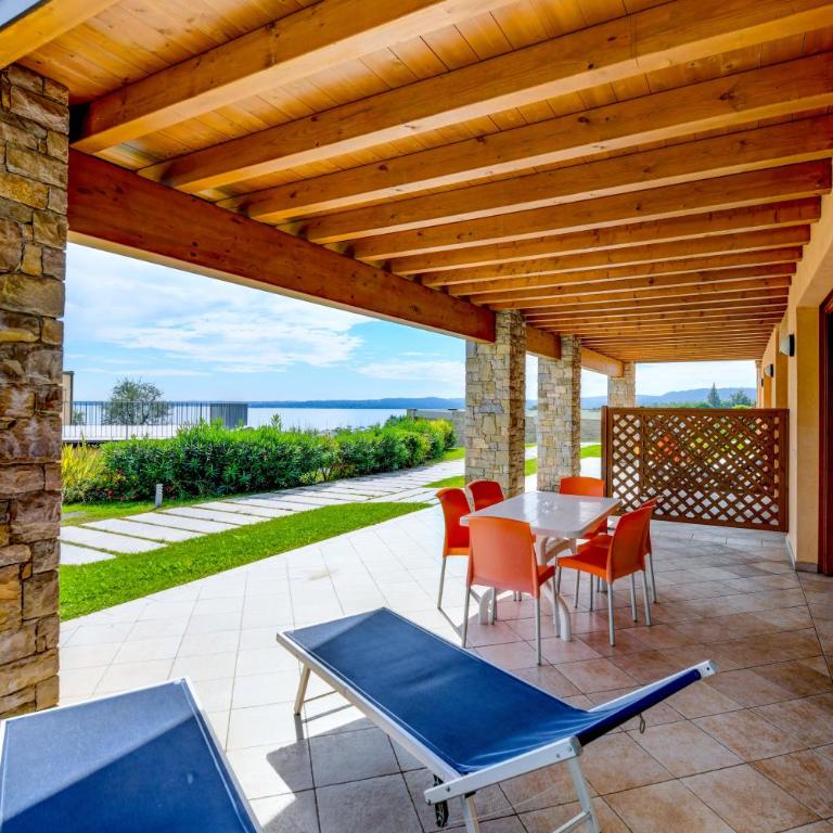 Relais Rosa Dei Venti -Ciao Vacanze- - Appartamento Standard con 2 Camere da Letto e Vista Lago Parziale - 8
