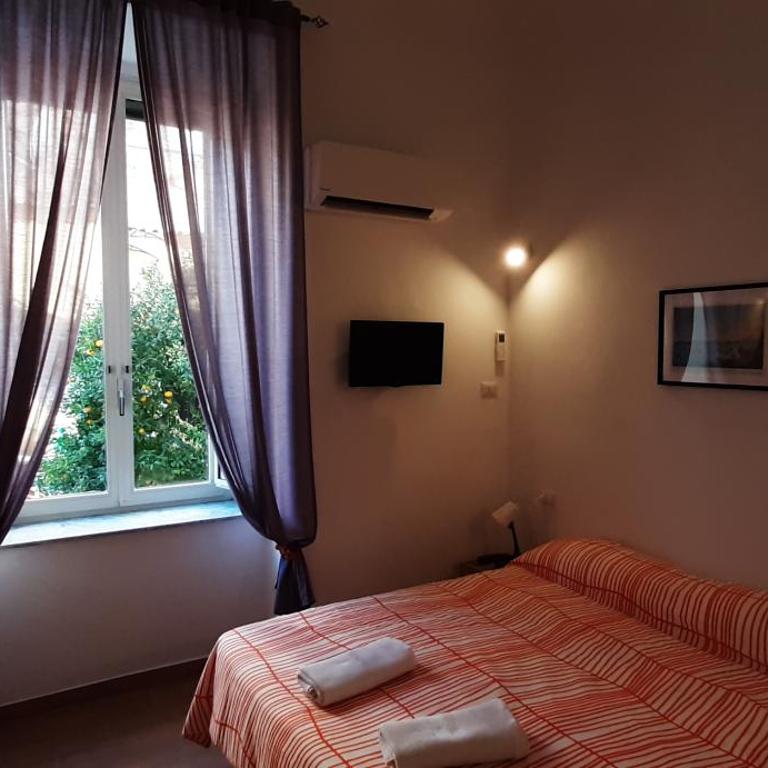 Casa Laura Oliva Mancini - Camera Familiare con Bagno Privato - 2
