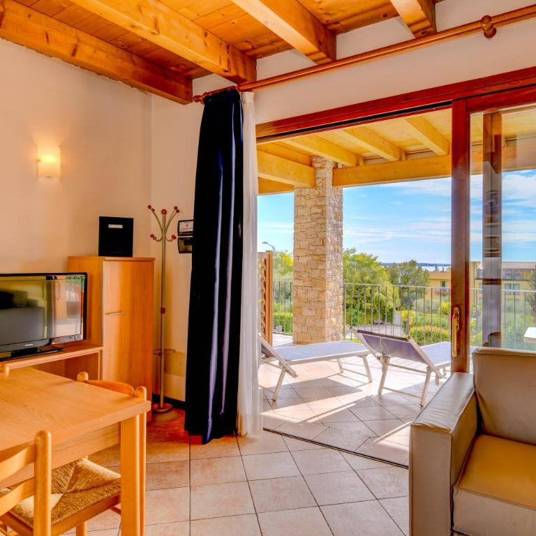 Relais Rosa Dei Venti -Ciao Vacanze- - Appartamento Standard con 1 Camera da Letto e Vista Lago Parziale - 12