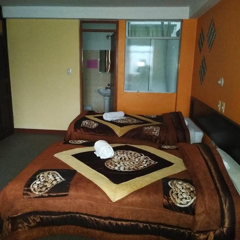 Hostal Lucky Puno - Habitación Cuádruple con baño privado - 1